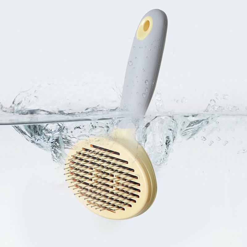 One-button hair removal self-cleaning steel needle pet brush